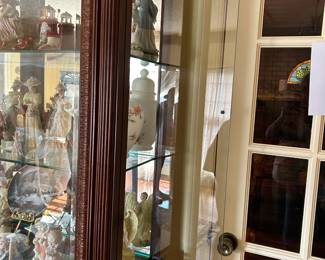 #19 glass from display cabinet w 4 glass shelves lighted with side door open 37x14x80 $275.00