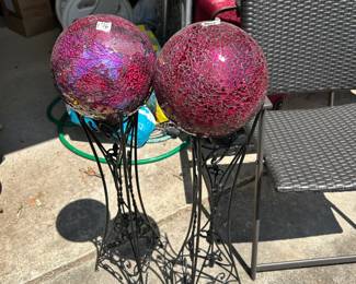 #176 pair of red gazing balls on metal stands 36 tall $40.00