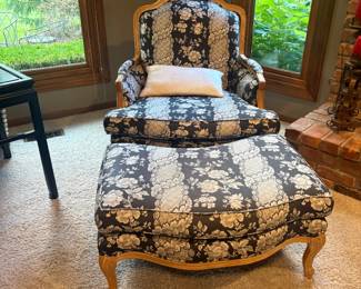 . . . French Provinical upholstered chair and ottoman