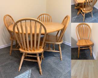 light wood Windsor-style dining set round drop-leaf table with a sturdy pedestal base and four spindle-back chairs