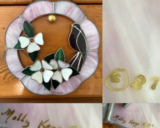 handcrafted circular stained glass suncatcher white dogwood-style blossoms and a dark bird, signed "Molly Keys 98