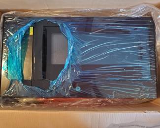 Brand new in-the-box over the range Microwave GE