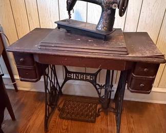 Singer "Red Eye" Treadle Sewing Machine in Wooden Cabinet
