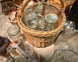 Vintage Wicker Basket with Assorted Glass Bottles and Jars