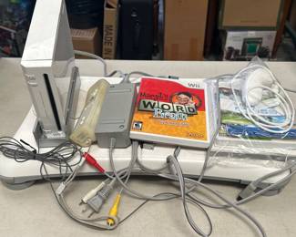 Lot 390: Nintendo Wii Console with Balance Board & Wii Fit Plus