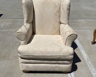 Lot 0370: Ivory Damask Upholstered Wingback Armchair, Bun Feet