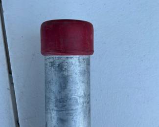 Lot 4047: Threaded Galvanized Steel Pipe with Red End Caps
