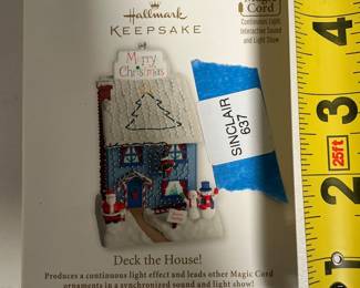 Lot 4061: Hallmark Keepsake "Deck the House" 2012 Magic Cord Ornament