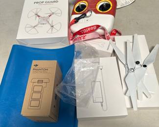 Lot 212: DJI Phantom 2 Remote, Props, Prop Guard & Charger Lot