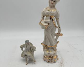 Lot 2756: White & Gilt Porcelain Colonial Lady & Gentleman Figurines