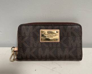 Lot 10011: Michael Kors Signature Monogram Zip-Around Wristlet Wallet