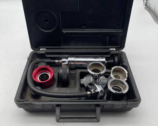 Lot 2850: Cooling System Pressure Tester Kit with Adapters, Case