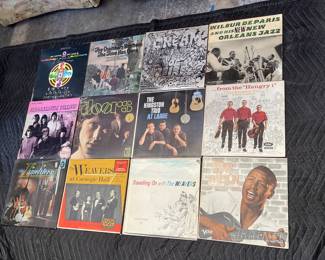 Lot 9007: 24 Vinyl LPs: The Doors, Cream, Kingston Trio & Weavers