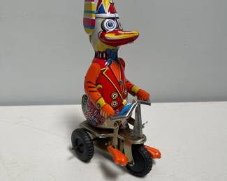 Lot 10054: Duck on Bike Wind-Up Tin Toy