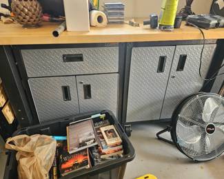 You get the three tall ones and the short work bench for $1,500 and if you do the open metal storage shelves will be $100 each