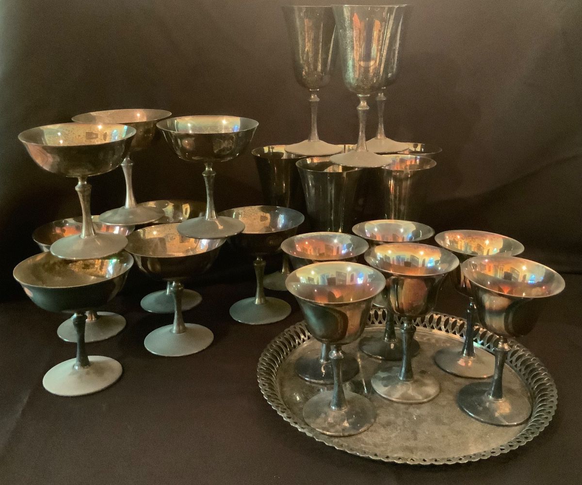 Silver plated water, champagne, wine glasses and silver plated serving tray