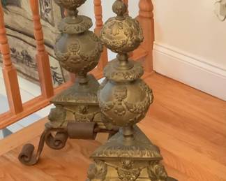 Pair Renaissance revival andirons. 18 1/4” W x 27” H.