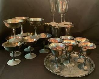 Silver plated water, champagne, wine glasses and silver plated serving tray