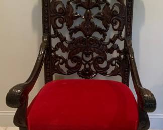 19th century Mahogany/Walnut carved Renaissance Revival chair. Upholstered seat in scarlet red velvet. 55 1/2” H x 31”W x 28” D. À