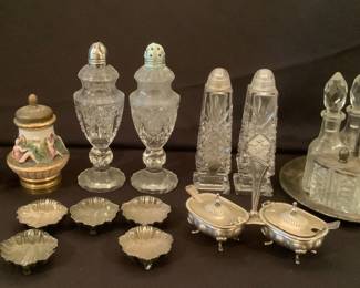 Assortment of salt/pepper shakers, cellars and cruet set
