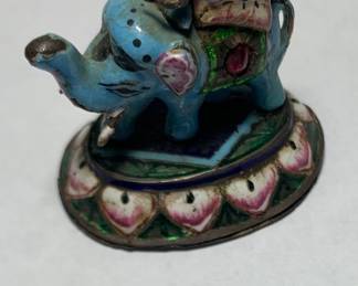 Vintage Indian Meenakari enameled silver elephant figurine featuring two riders in a howdah and mounted on an oval lotus petal base. From the Jaipur/Lucknow region of India. 1920s-1950s.