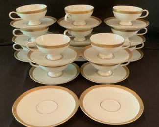 Sixteen demitasse cups and saucers (plus two extra)