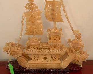 Rare yellow jade “Dragon Boat” w/ base. 24” W x 22” H.