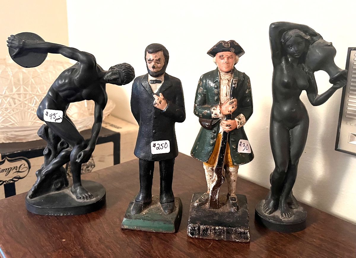 Vintage and antique doorstops and sculptures