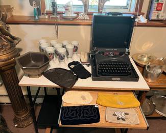 Vintage purses, Remington Rand typewriter in case, Vintage porcelain mazagran cups,  antique etched brass octagonal decorative bowl 