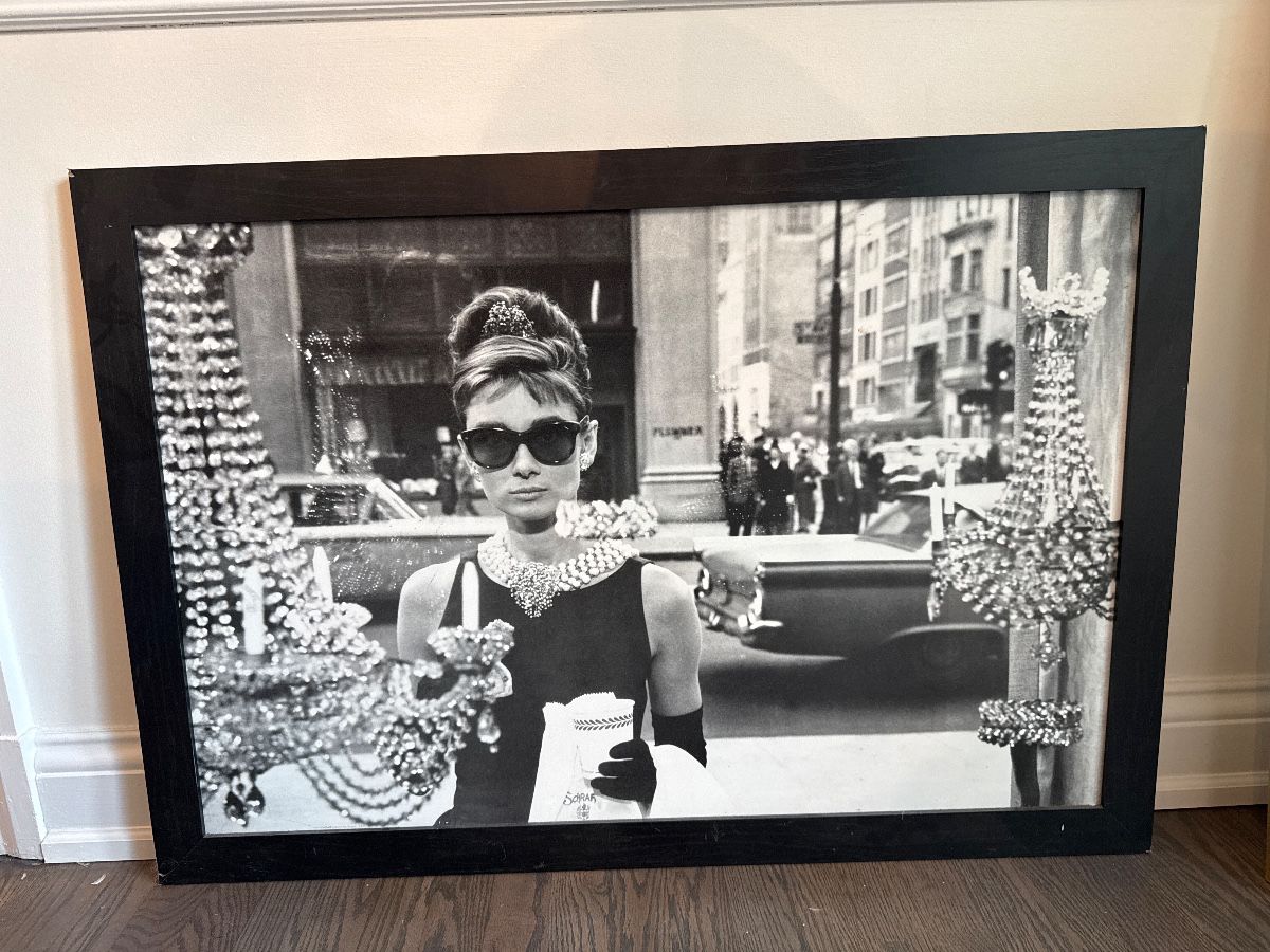 Breakfast at Tiffany’s Poster in black wood frame. 39 x 28” $50 NOT 50% off