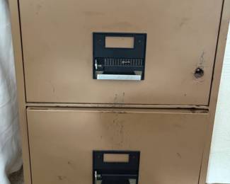 Heavy, fireproof filing cabinet (does not lock)