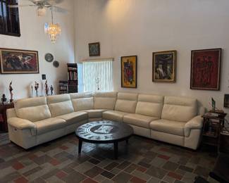 Available now! Cream color Natuzzi leather sectional