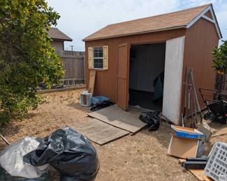 Other shed in back yard! tis area has been cleaned out and the shed is housing small kitchen appliances, home health items!