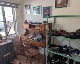 Bedroom #2 wood desk with chair, men's clothing and loads of shoes