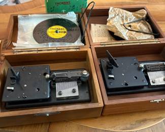 Antique music boxes with metal albums 
