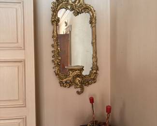 Pair of Rococo mirrors with shelf