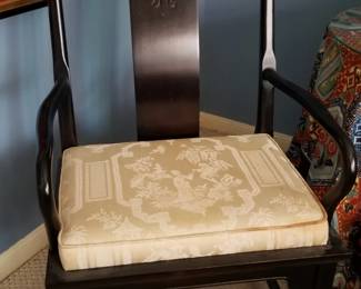 One of two Asian Century armchairs