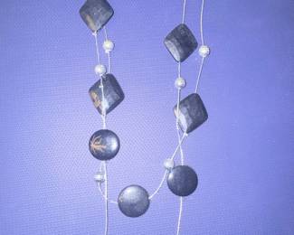 Artisan Style Multi-Strand Necklace with Carved Black Stone and Metallic Spacer Beads