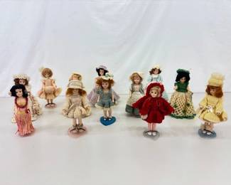 Collection of 12 Nancy Ann Dolls with Hand Knitted Outfits 