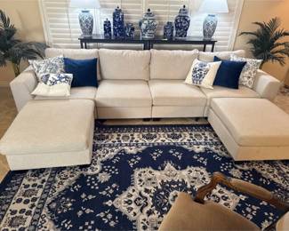 Beautiful Couch With A Couple Ottomans