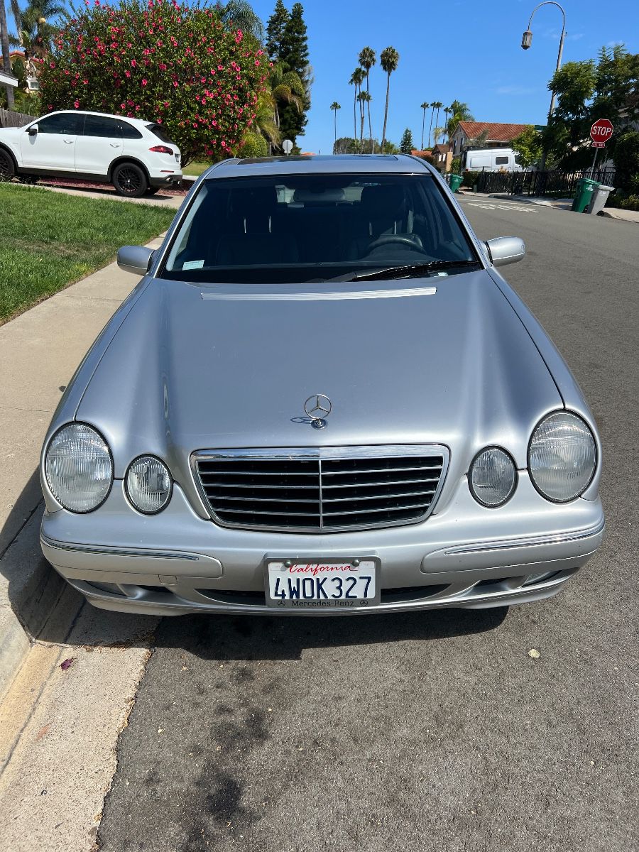 Mercedes E320 - the only issue one side view mirror has some fading! Mileage 56,990 2002 - very well kept!
