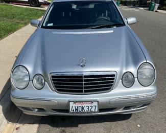 Mercedes E320 - the only issue one side view mirror has some fading! Mileage 56,990 2002 - very well kept!