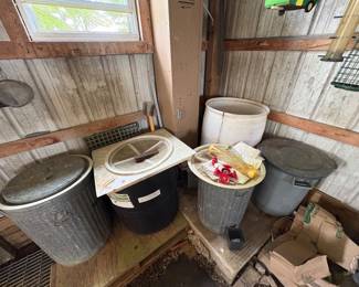 Storage cans and bird seed 
