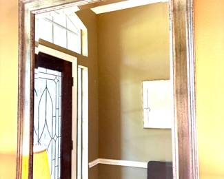 Silver tone mirror