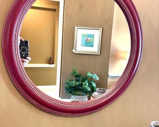 Burgundy round mirror
