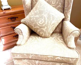 Scroll pattern wing back chair