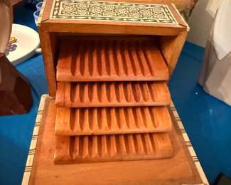 Wooden music box cigarette dispenser, mother-of-pearl design