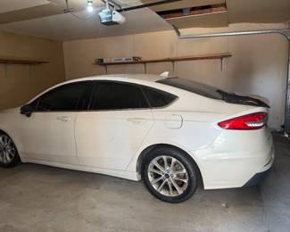 2020 Ford Fusion with 55,000 miles. Needs front-end repair