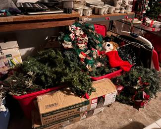 Lots of Christmas trees, wreats, greenery, plates, decorations, etc...