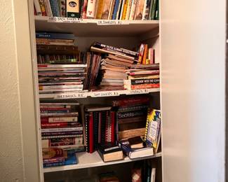 Multiple cookbooks and recipe boxes